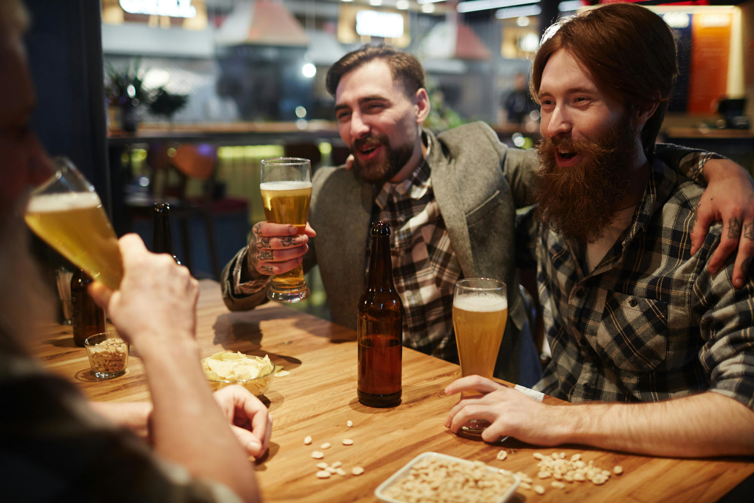 Friends celebrating in a Durham pub after completing a treasure hunt