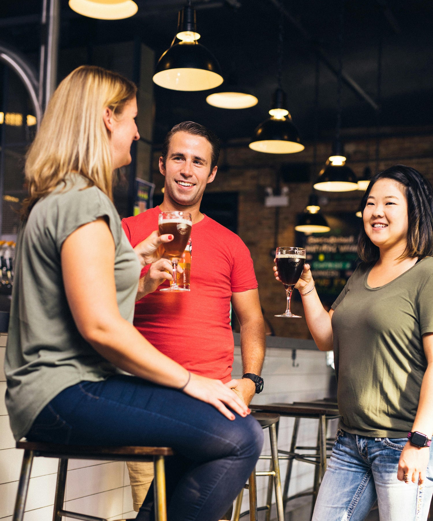 Friends celebrating in a Southampton pub after completing a treasure hunt