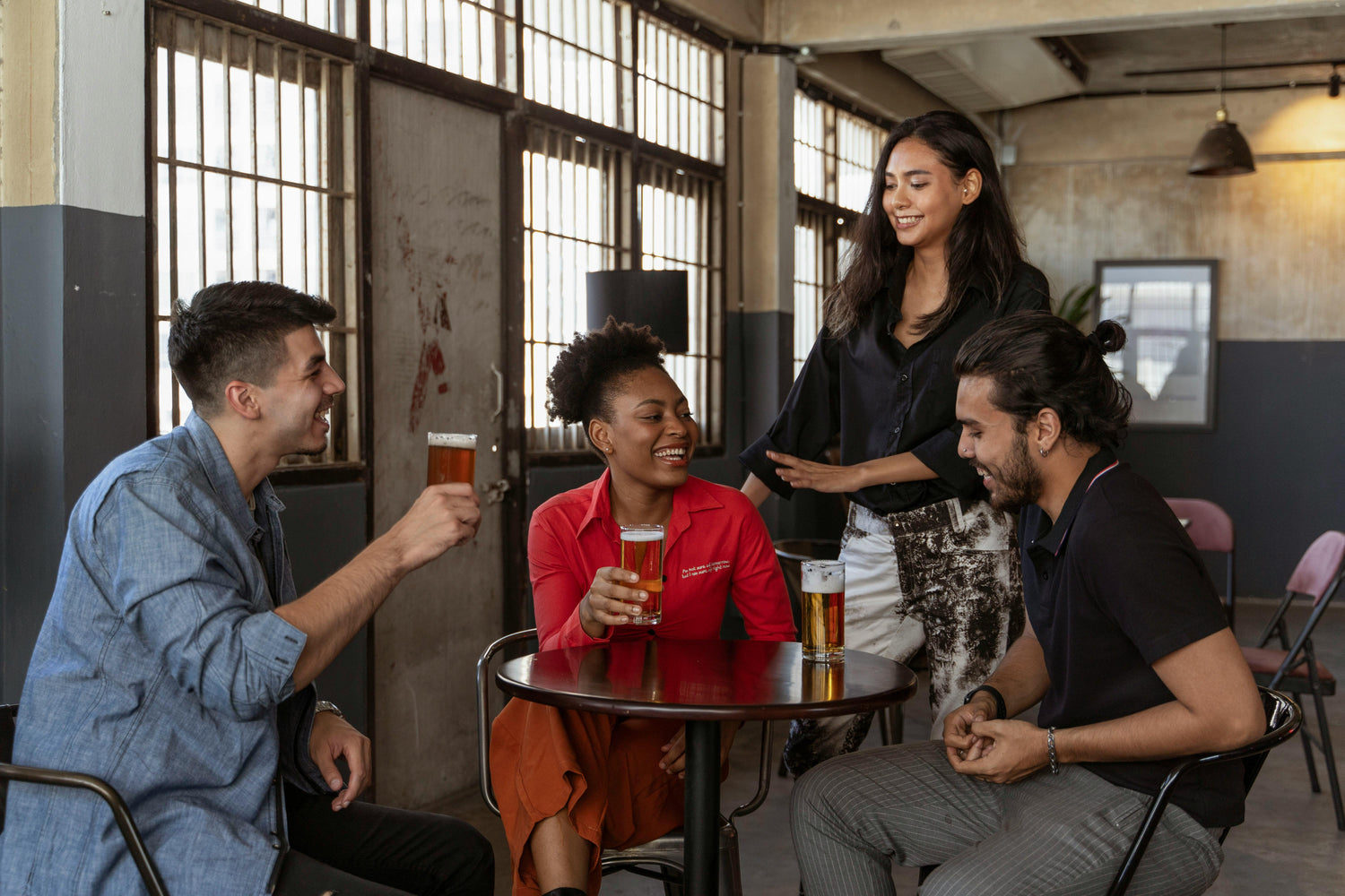Friends celebrating in a York pub after completing a treasure hunt