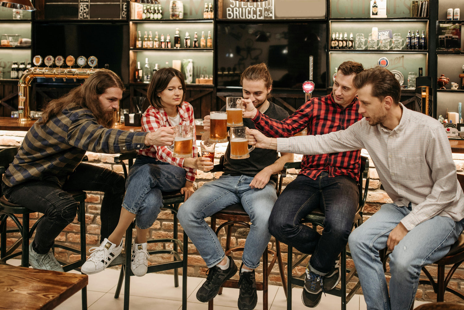 Friends celebrating in a Bath pub after completing a treasure hunt