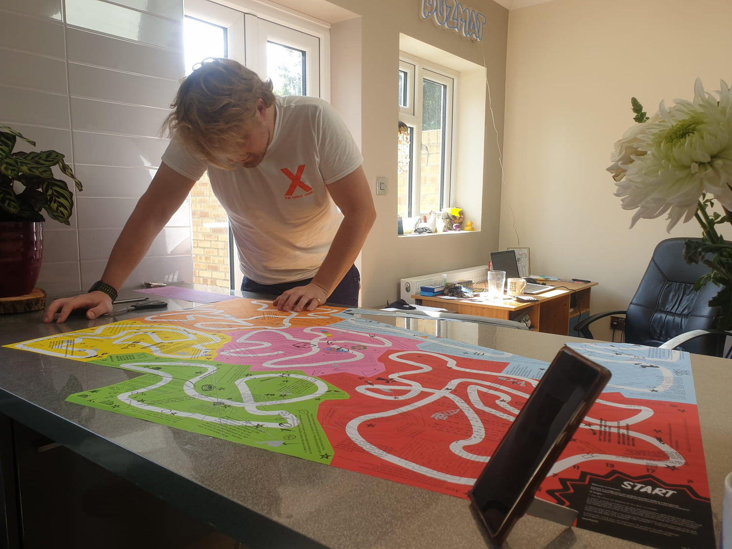 Bryn Powell playing a Puzmat puzzle game