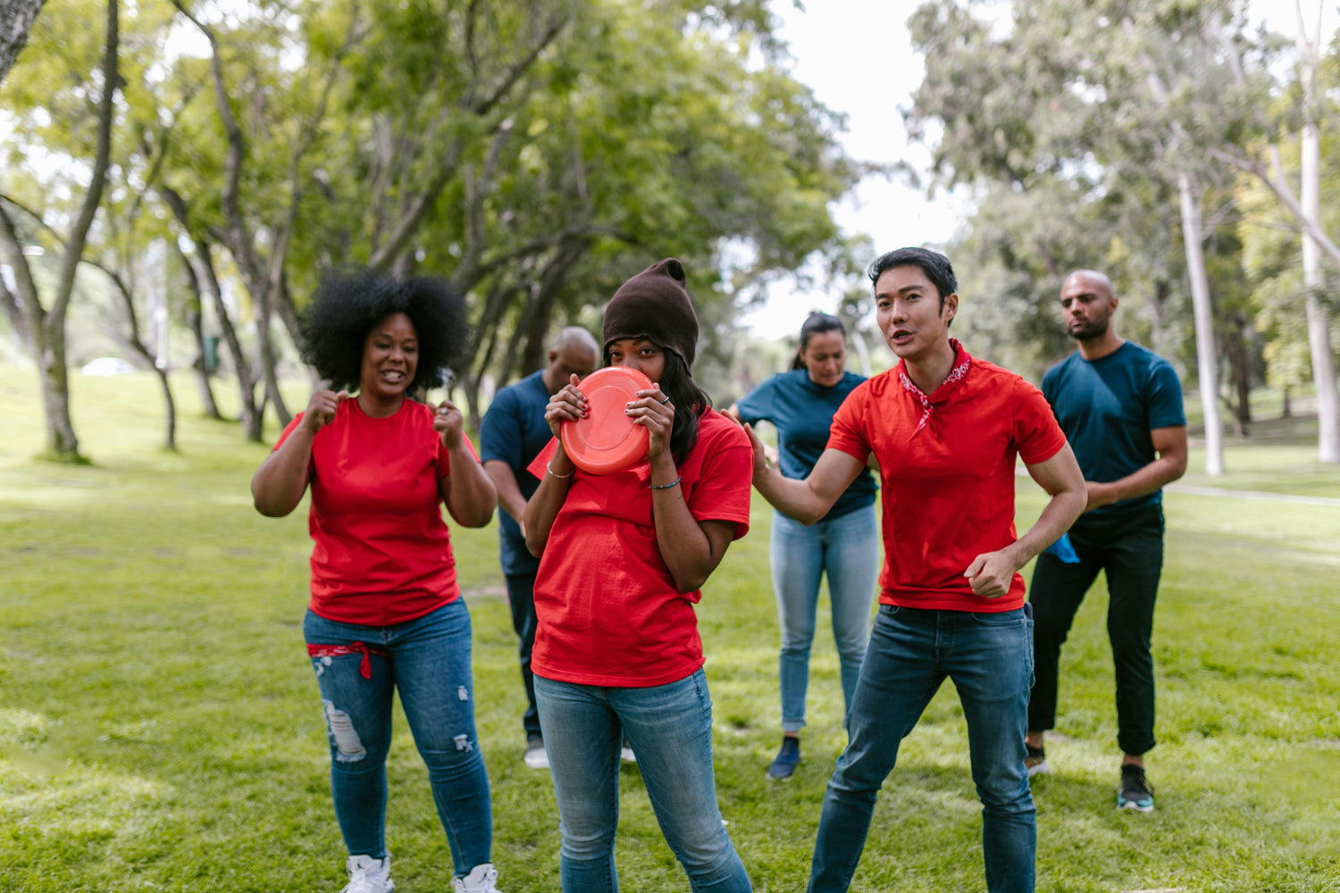 A corporate team solving clues during a London's Hyde Park scavenger hunt