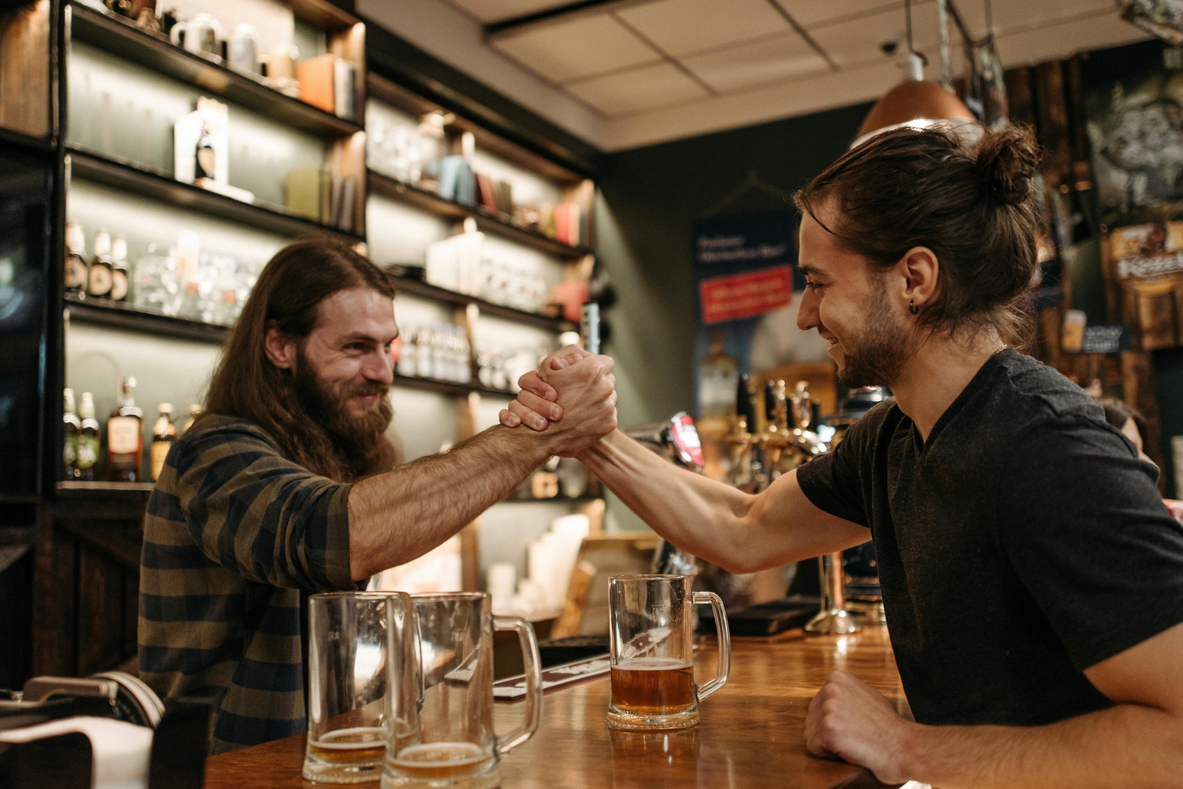 Friends celebrating in a Glasgow pub after completing a treasure hunt