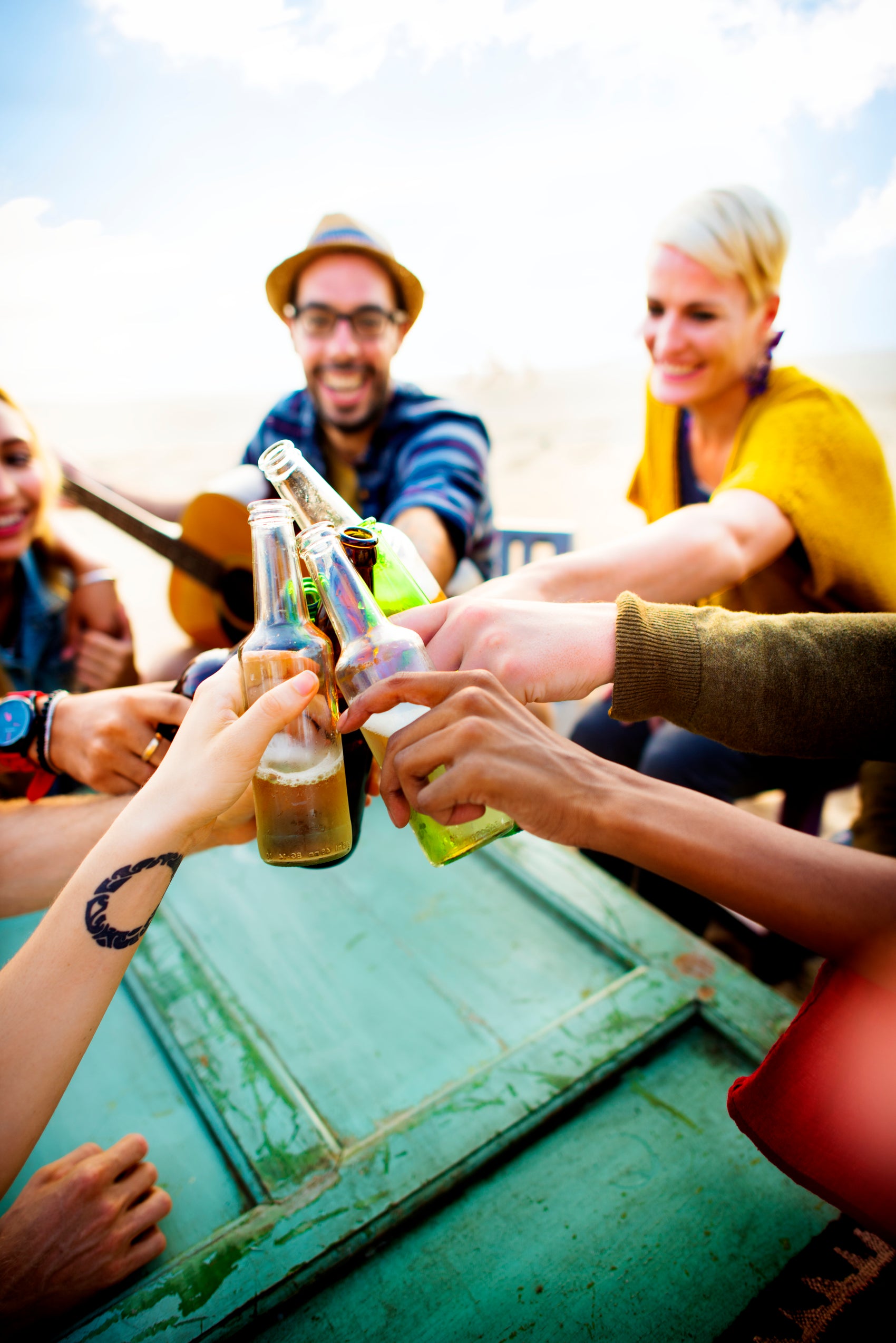 Friends celebrating in a London Hampstead Heath pub after completing a treasure hunt