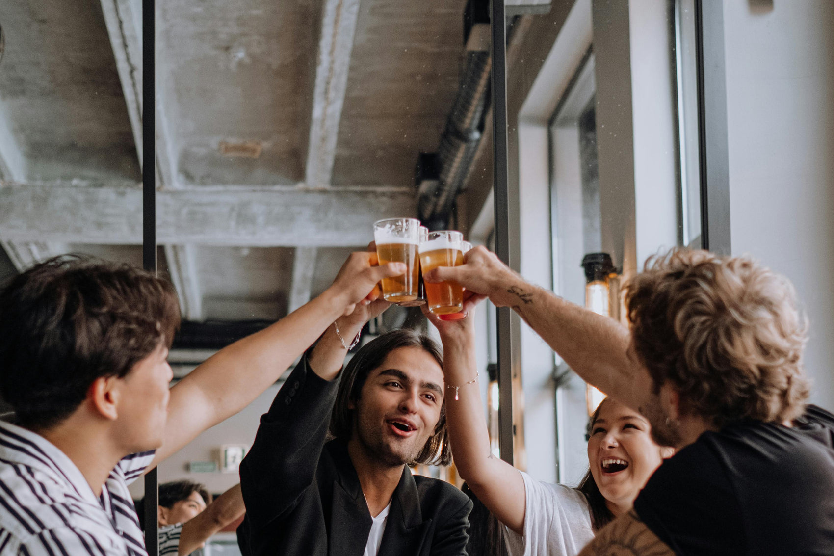 Friends celebrating in a London South Bank pub after completing a treasure hunt