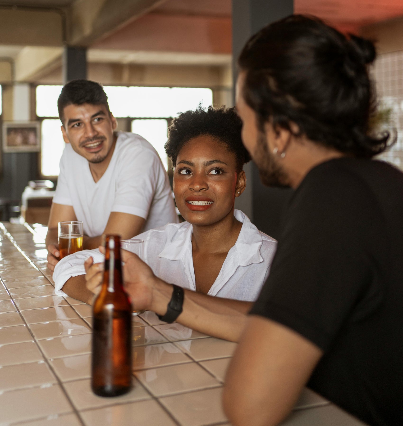 Friends celebrating in a London West End pub after completing a treasure hunt