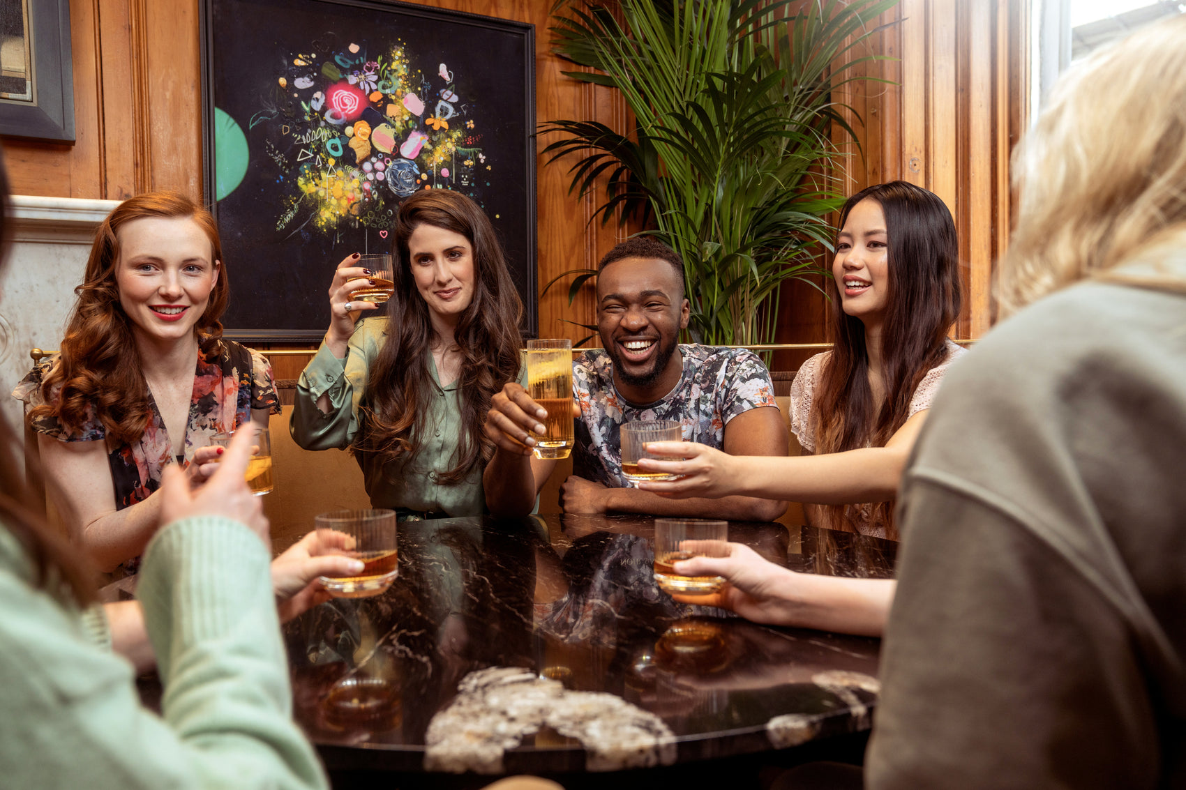 Friends celebrating in a Newcastle pub after completing a treasure hunt