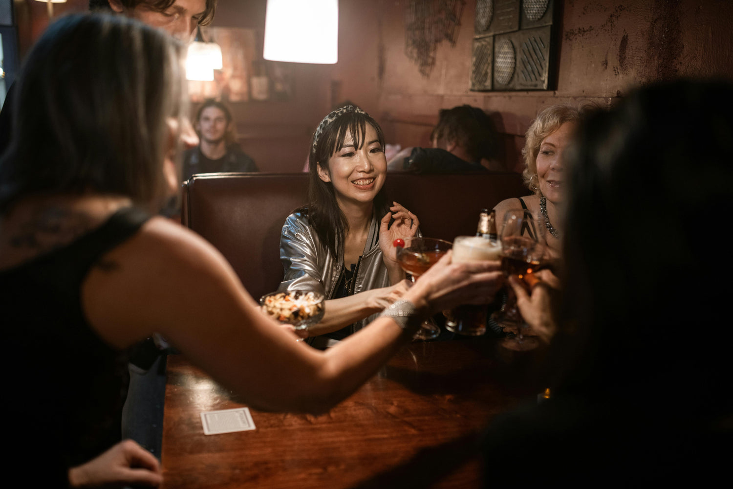 Friends celebrating in a St Albans pub after completing a treasure hunt 