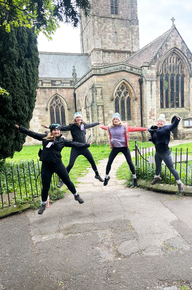 Team celebrating during a Great Game team building treasure hunt