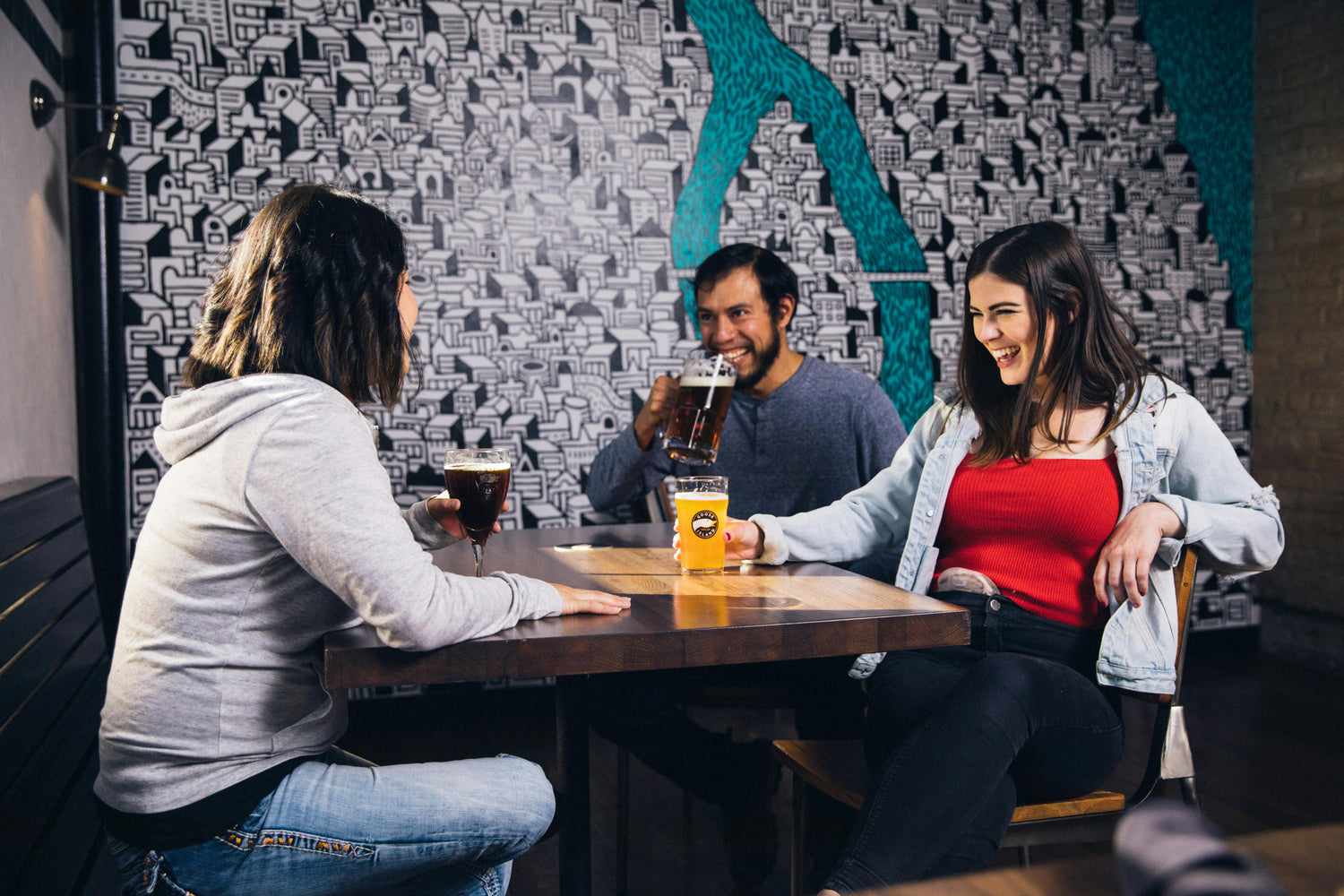 Friends celebrating in a City of London pub after completing a treasure hunt