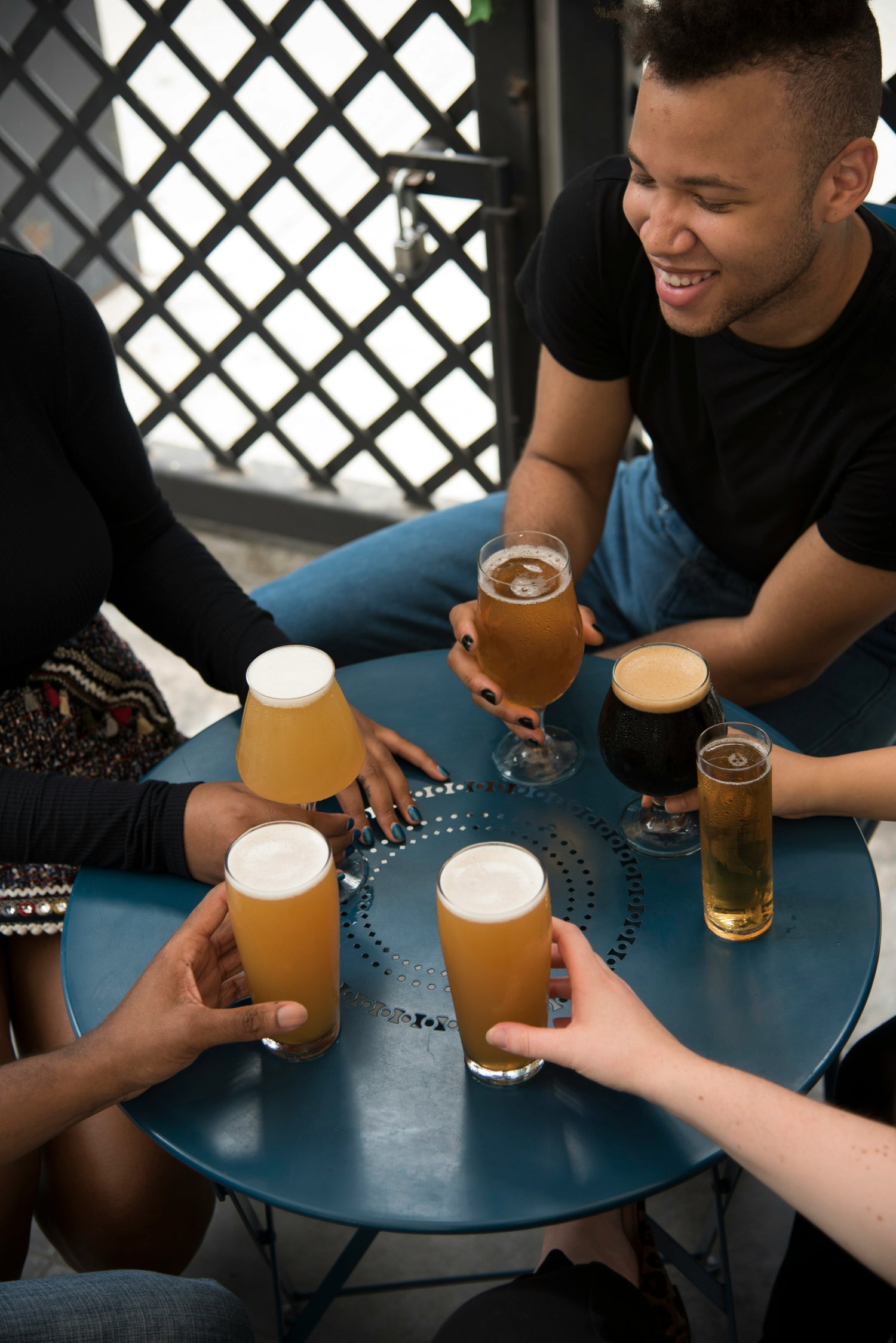 A group relaxing after finishing a treasure hunt in Cambridge.