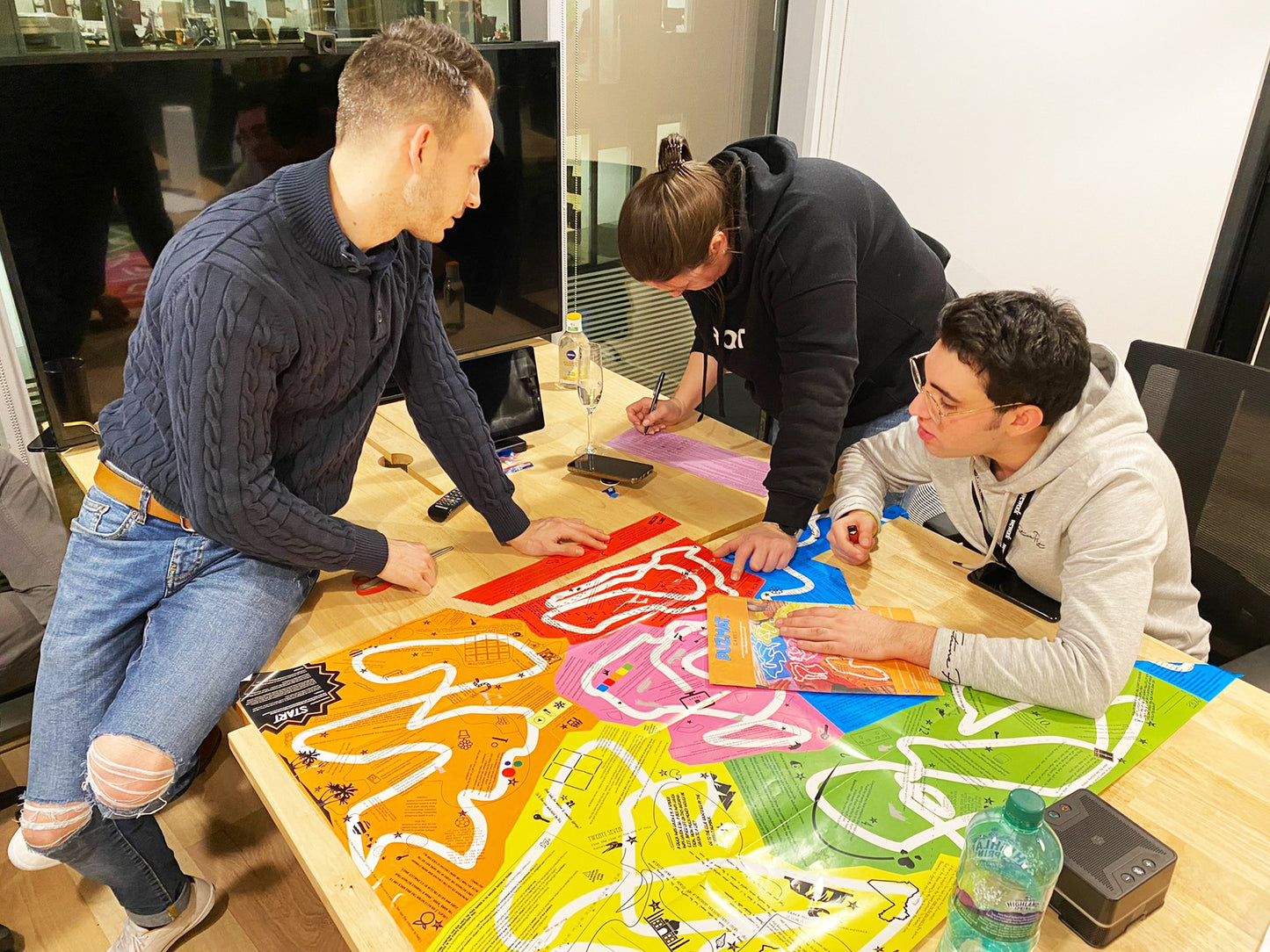 Adults playing Puzmat strategy puzzle game