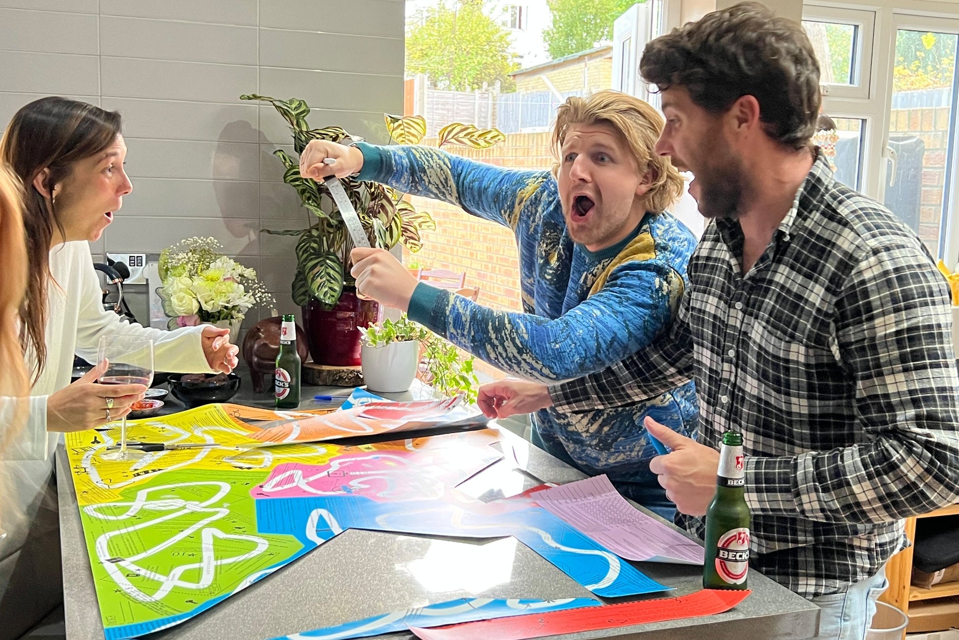 Family laughing while playing Puzmat